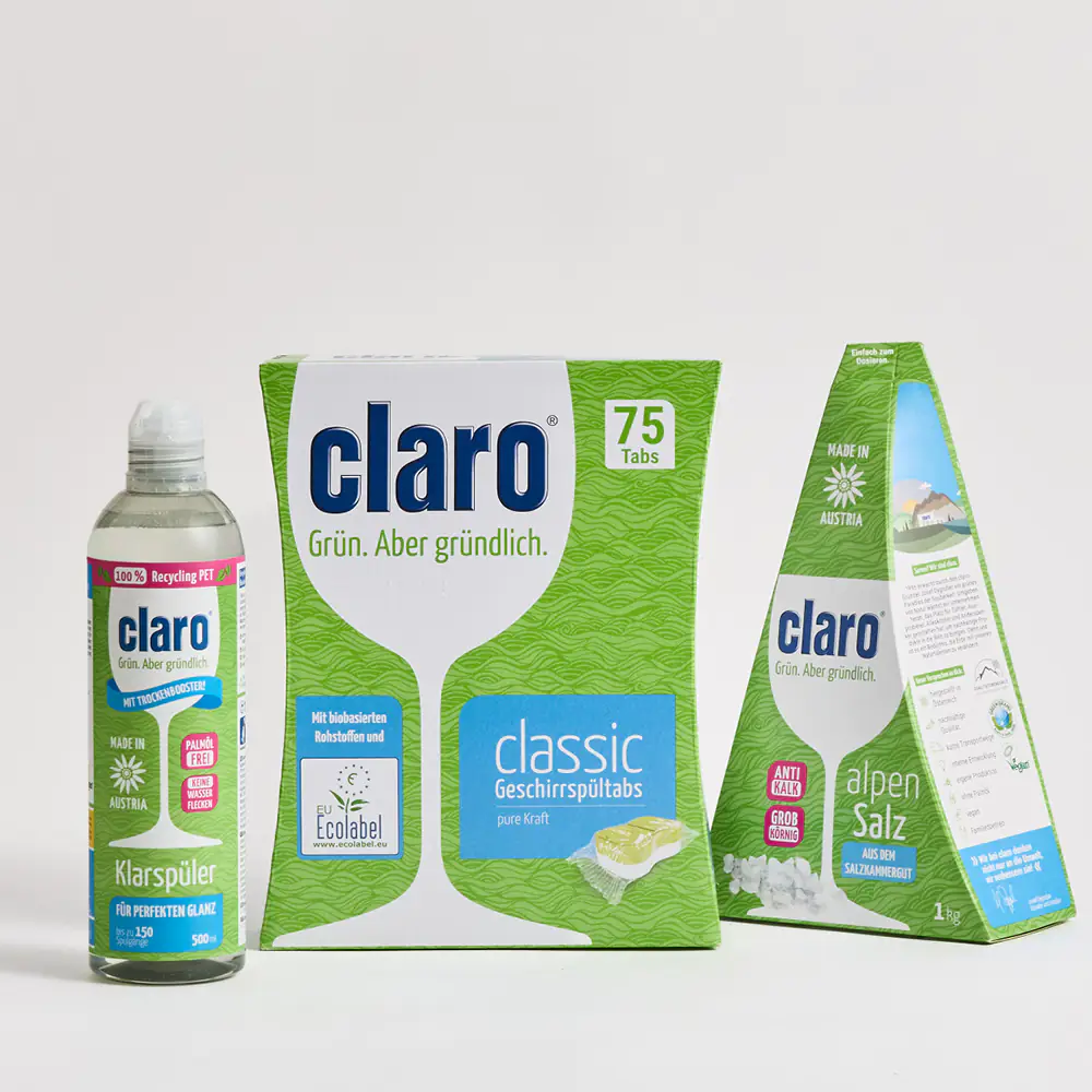 Systempaket mit claro Spülprodukten: claro Classic Geschirrspültabs, claro Alpensalz, claro Klarspüler als nachhaltiges Vorteilspaket arrangiert